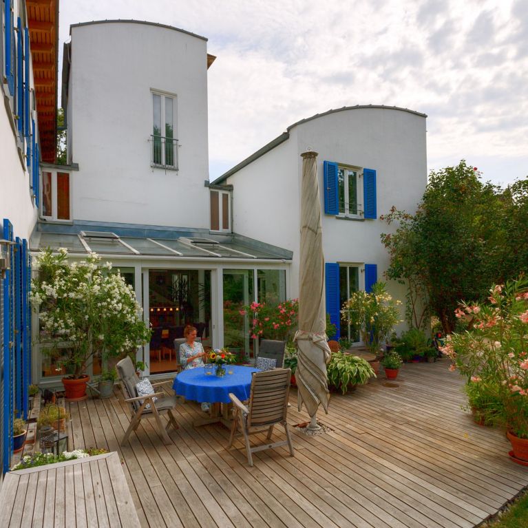 Wintergarten mit offener Terrassentür